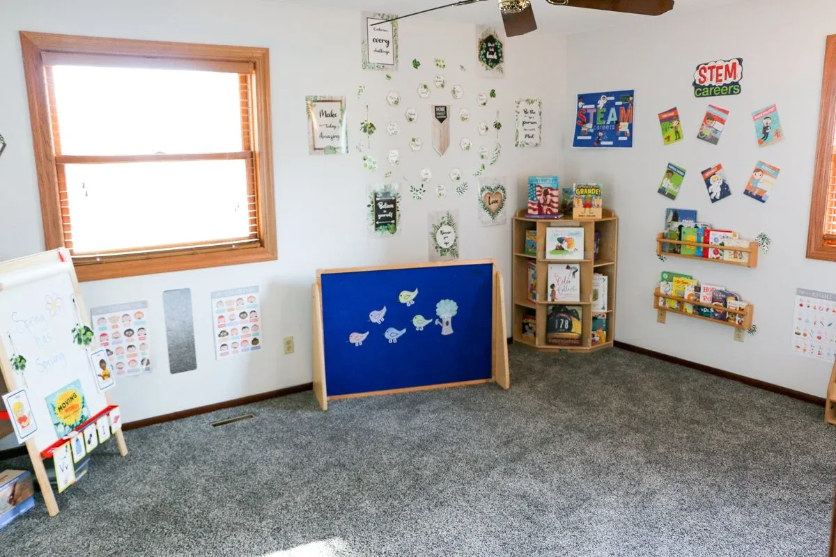 Kempfer Lane room with floor cushions, wall displays, and a window at BBDS Kempfer Lane, Verona, WI