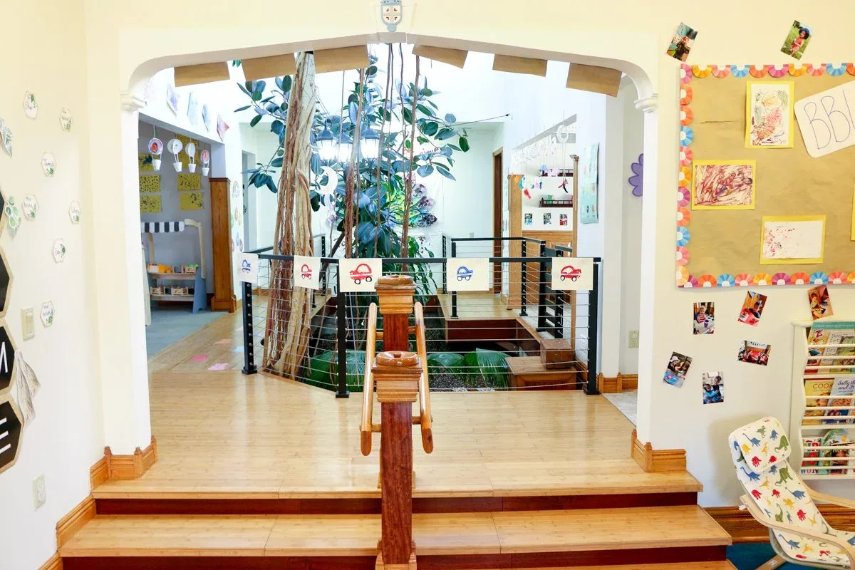 Kempfer Lane classroom viewed past a wooden room divider at BBDS Kempfer Lane, Verona, WI