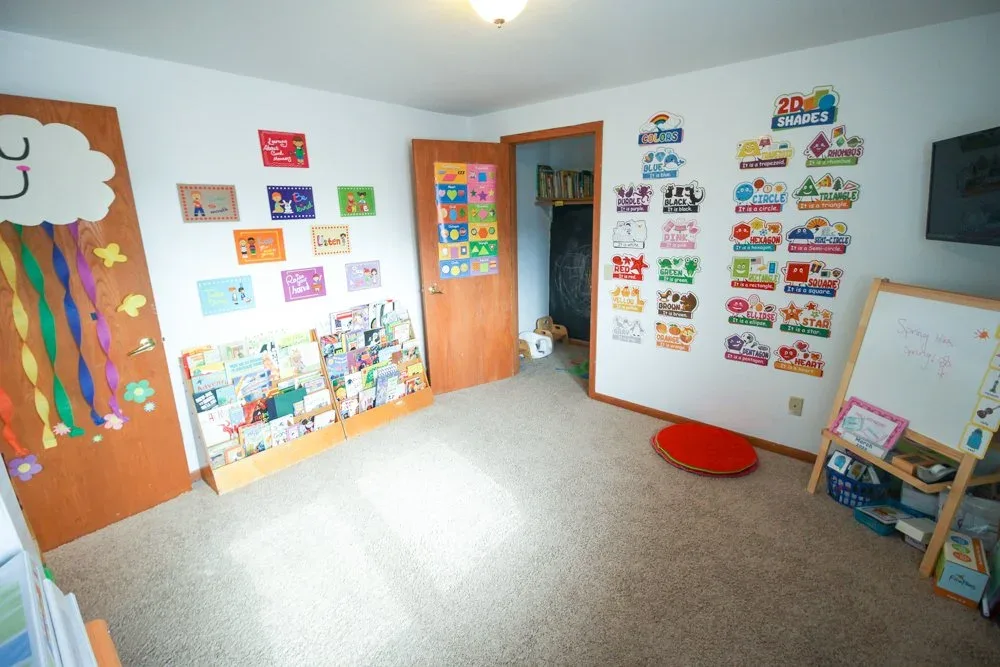 Morraine View room with wall displays, a doorway, and low floor cushions at BBDS Morraine View, Madison, WI