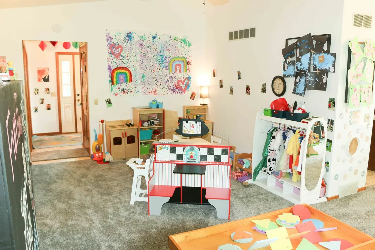 Valley Woods classroom with activity tables and pretend-play toys at BBDS Valley Woods, Verona, WI
