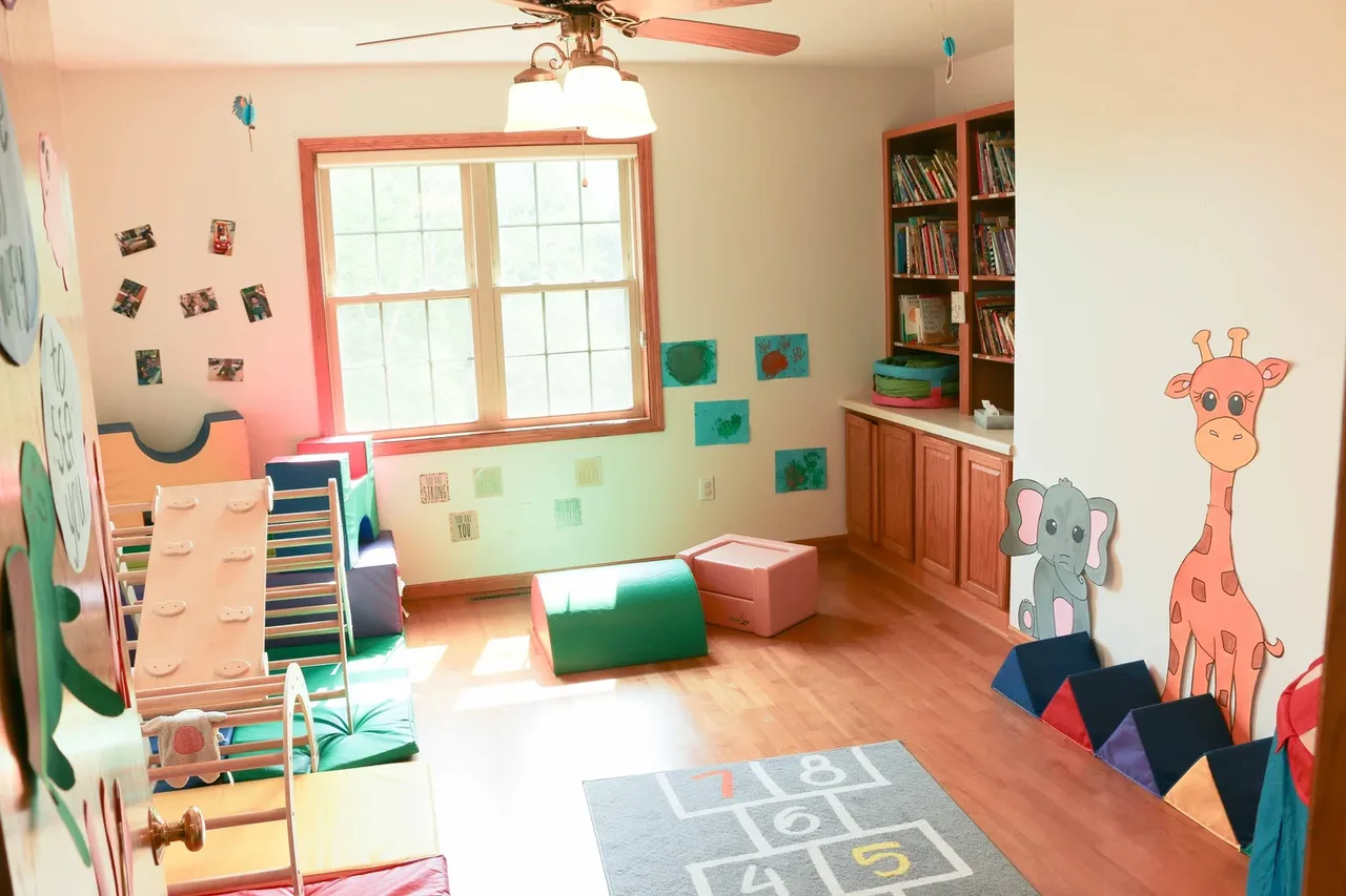 Castle Pines room with toy cubbies and colorful wall decorations at BBDS Castle Pines, Madison, WI